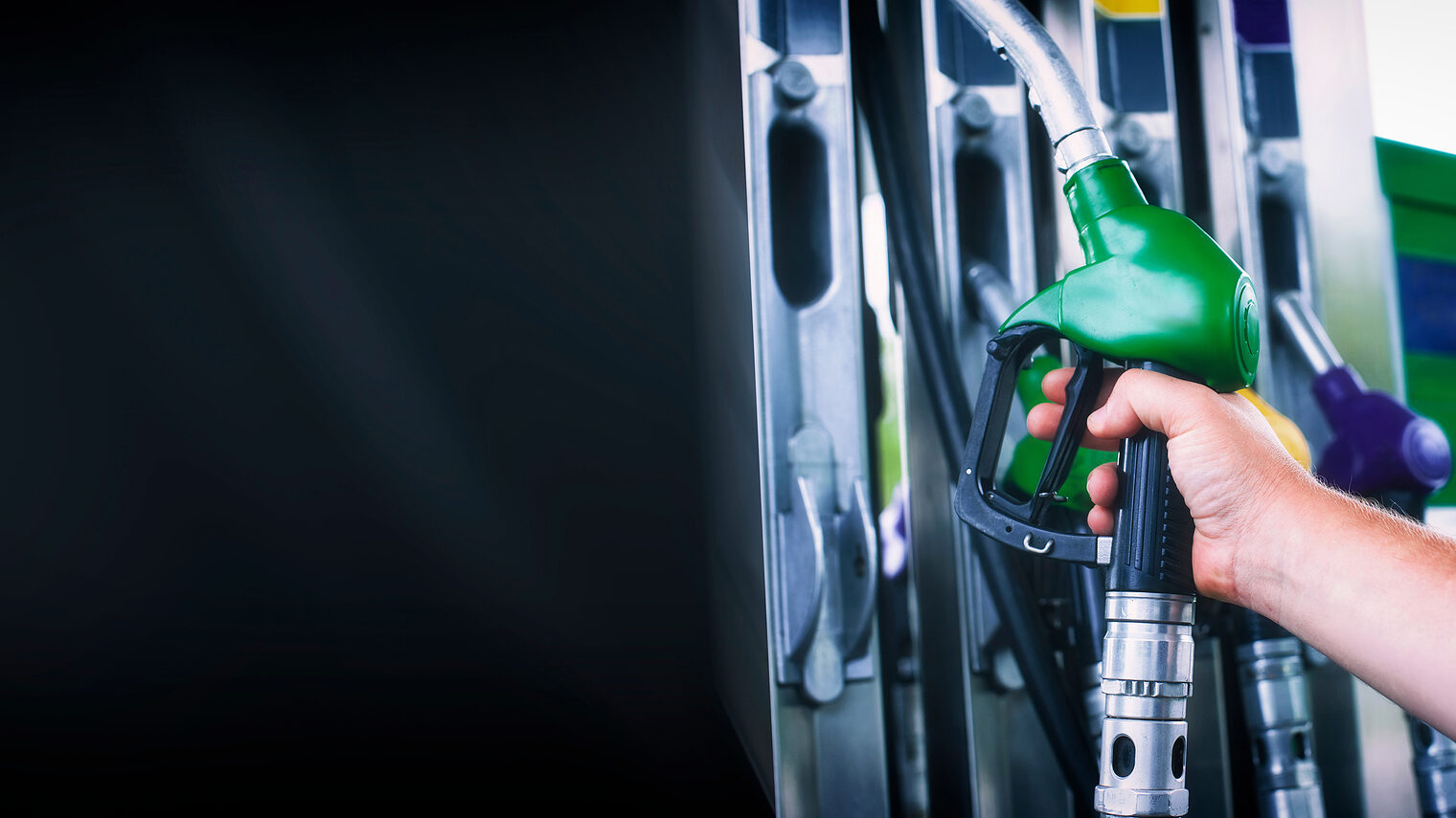 Man holds a refueling gun in his hand for refueling cars. Gas station with diesel and gasoline fuel close-up Schlagwort(e): station, gas, close, up, hand, people, pumping, gasoline, gun, fuel, car, petrol, background, pump, service, oil, energy, blue, industry, petroleum, close-up, transport, diesel, man, guy, hold, vehicle, refuel, benzine, sign, power, transportation, refueling, gallon, colorful, price, symbol, cost, isolated, economy, barrel, fueling, green, pollution, environment, automotive, shop, truck, auto, eco