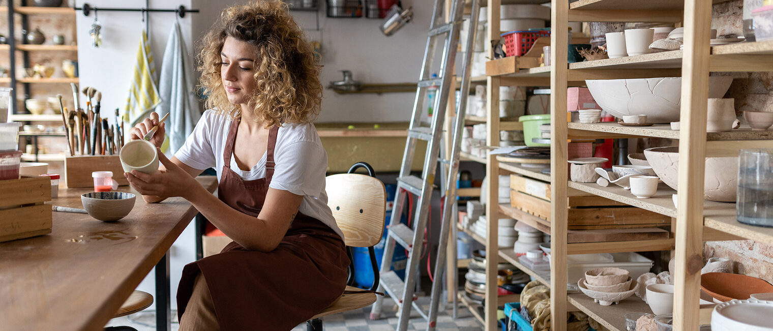 pottery, artist, art, ceramics, work, working, potter, people, woman, young, adult, casual, attractive, female, happy, caucasian, enjoying, one person, beautiful, positivity, confident, individual, day, girl, millennials, hipster, craft, craftsperson, hobbies, business, studio, workplace, making, workshop, skill, clay, creativity, small business, entrepreneur, hand made, design, crockery, apron, sculptor, shop, retail, smiling, businesswoman, professional, occupation